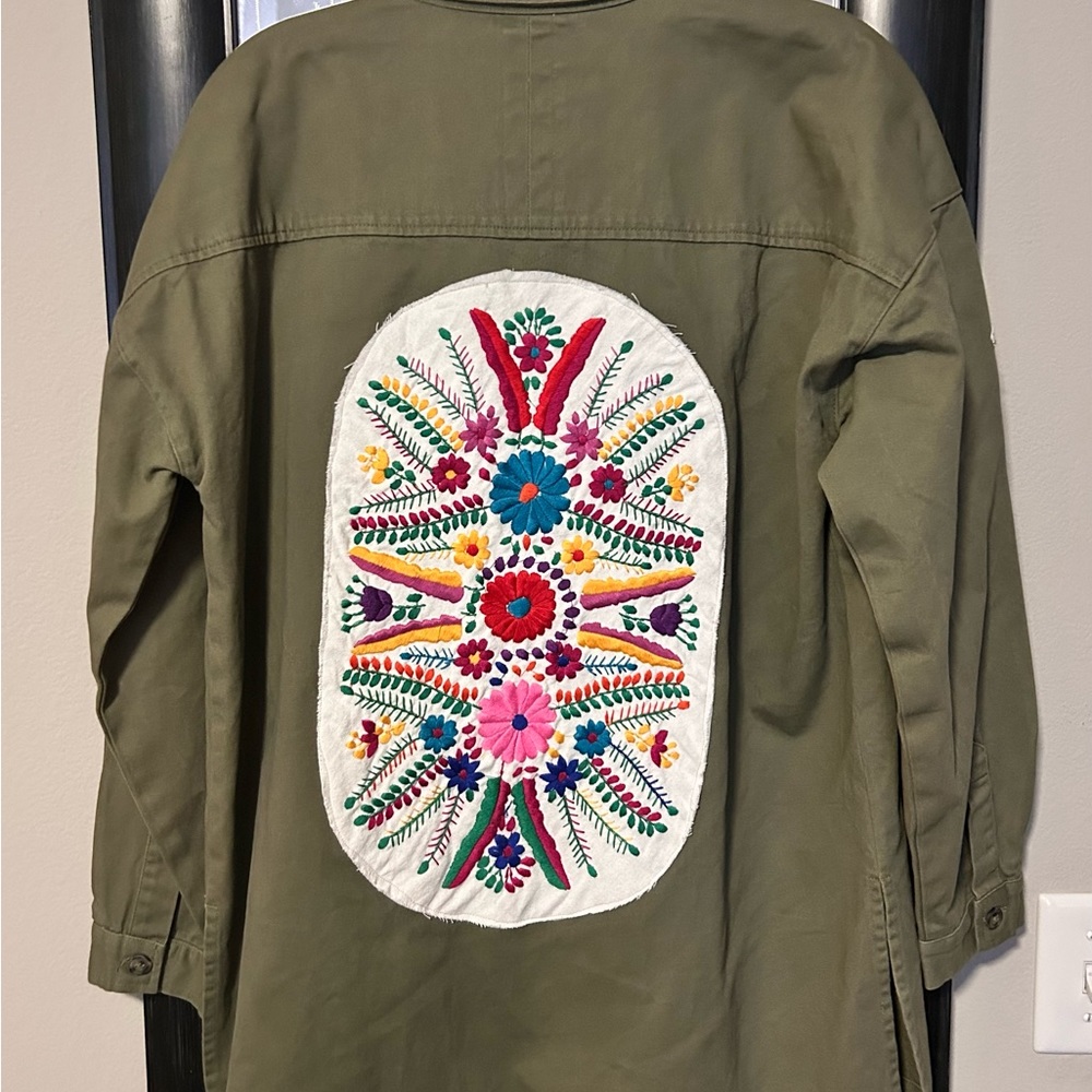 Women’s military canvas type button down with unique patches & embroidery.